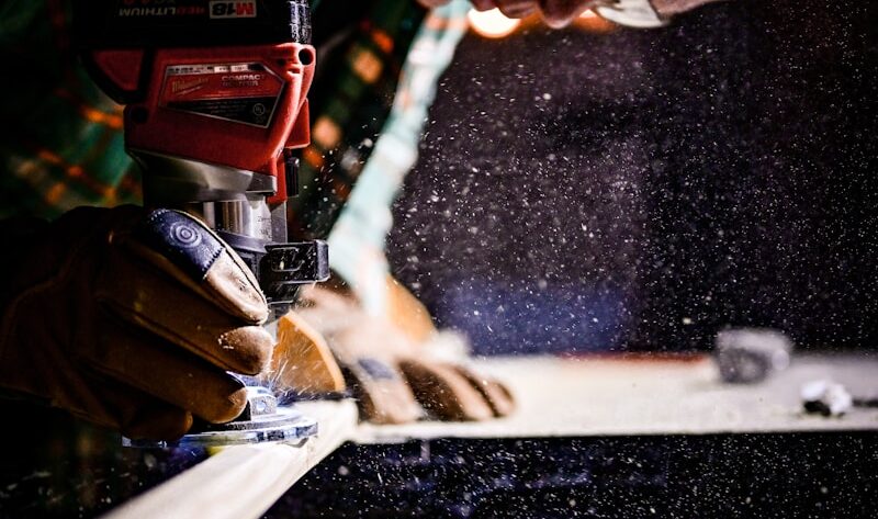 Carpenter using a router